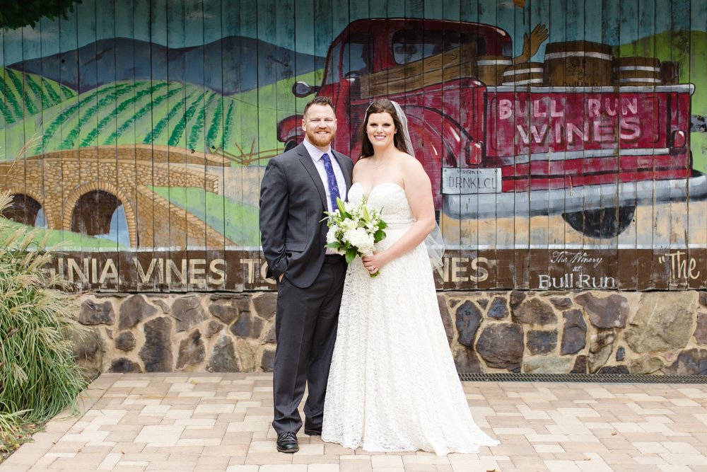 Bride and groom with TWABR mural