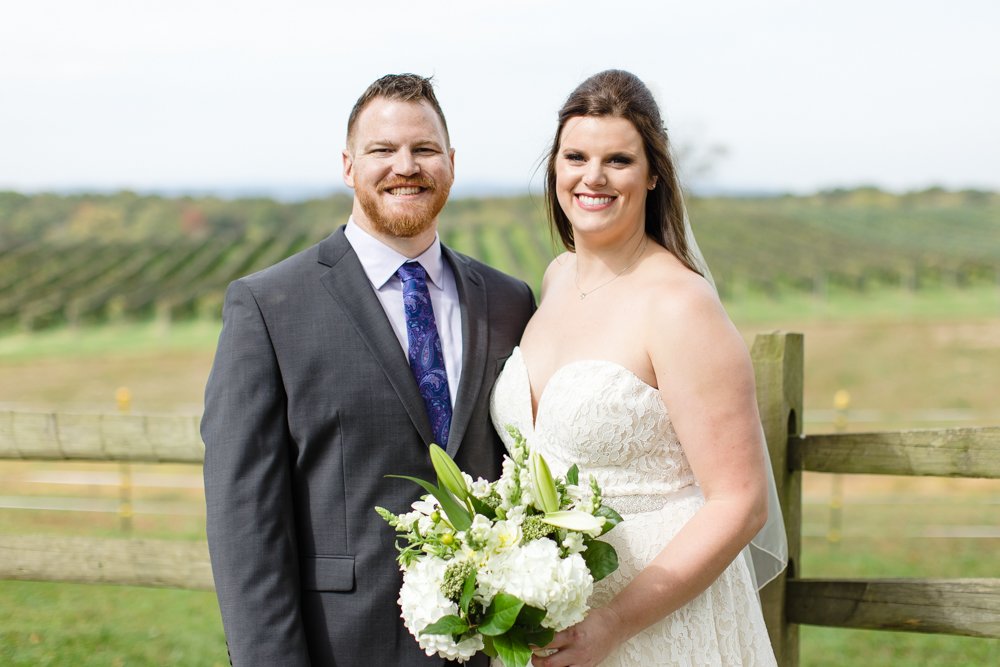 Smiling bride and groom at Winery at Bull Run