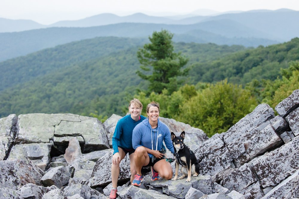 Hiking engagement photo with dog