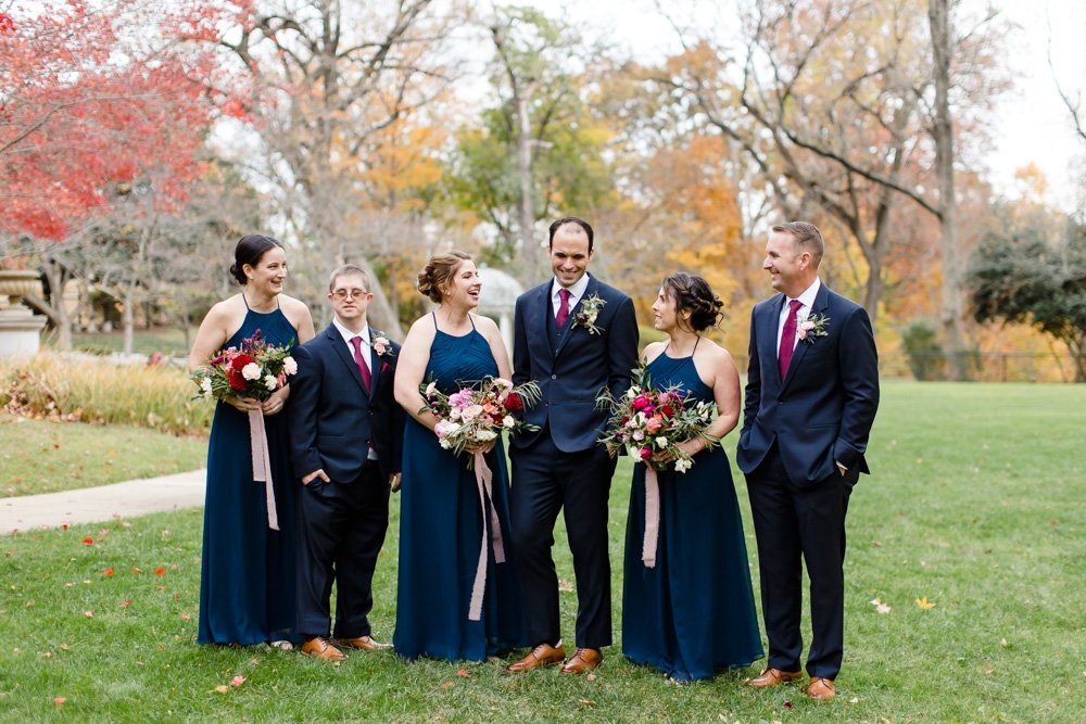 Groom and his wedding party wearing navy