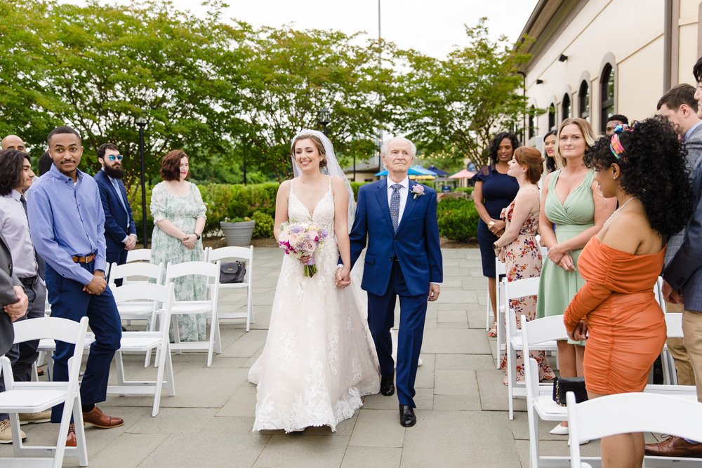 Bride walking down the aisle during her wedding ceremony