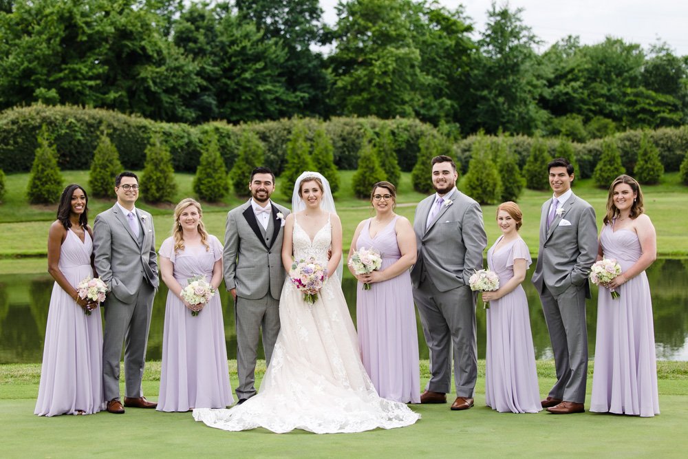 Purple and gray wedding party on the golf course