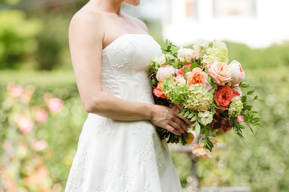 Summer bridal bouquet with pinks and corals