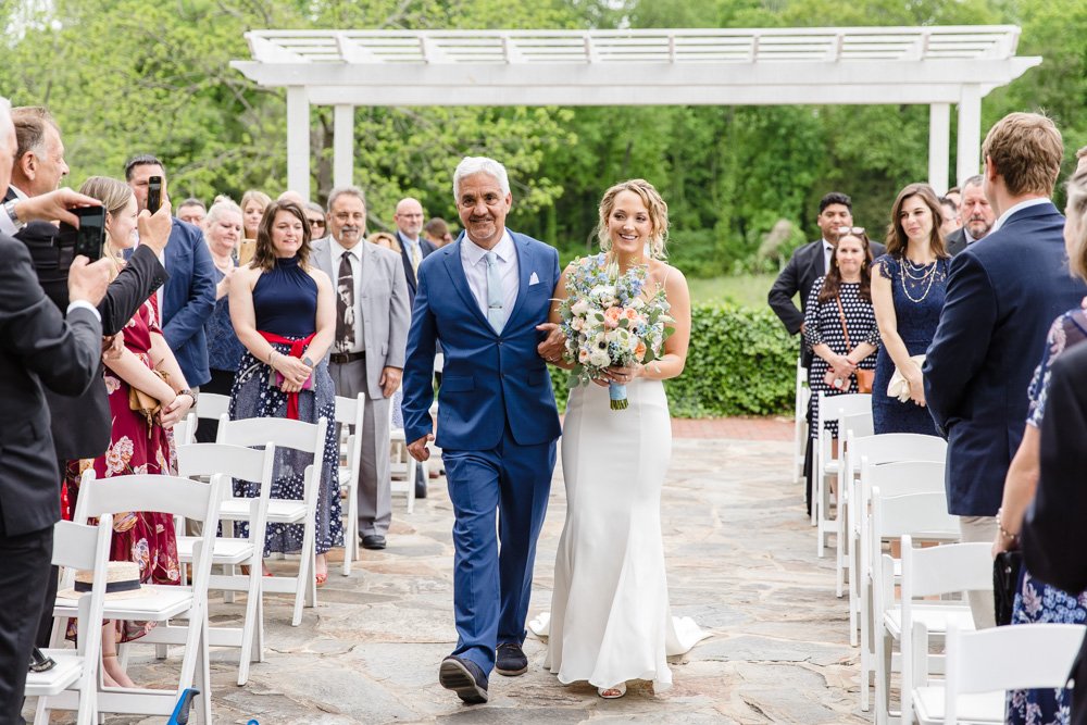  Bride walking down the aisle with her dad 