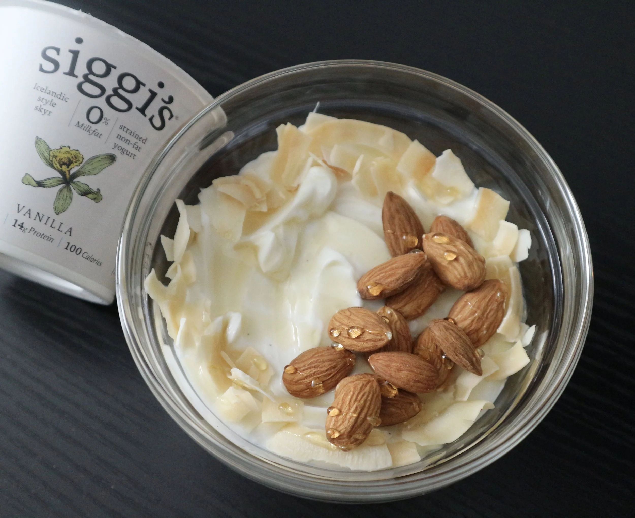 Vanilla yogurt with almonds, toasted coconut, & honey
