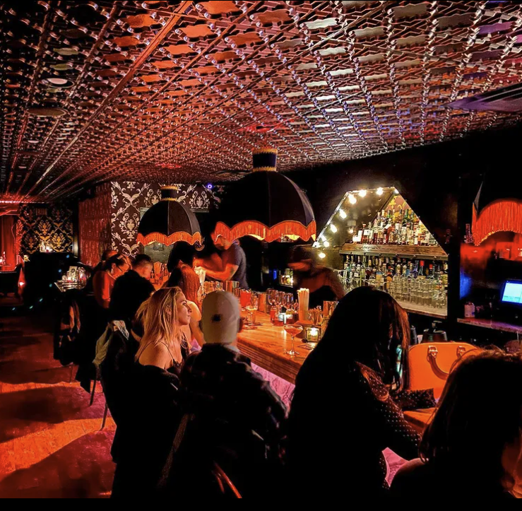 Subletinn employees enjoying a night at a bar in Chicago