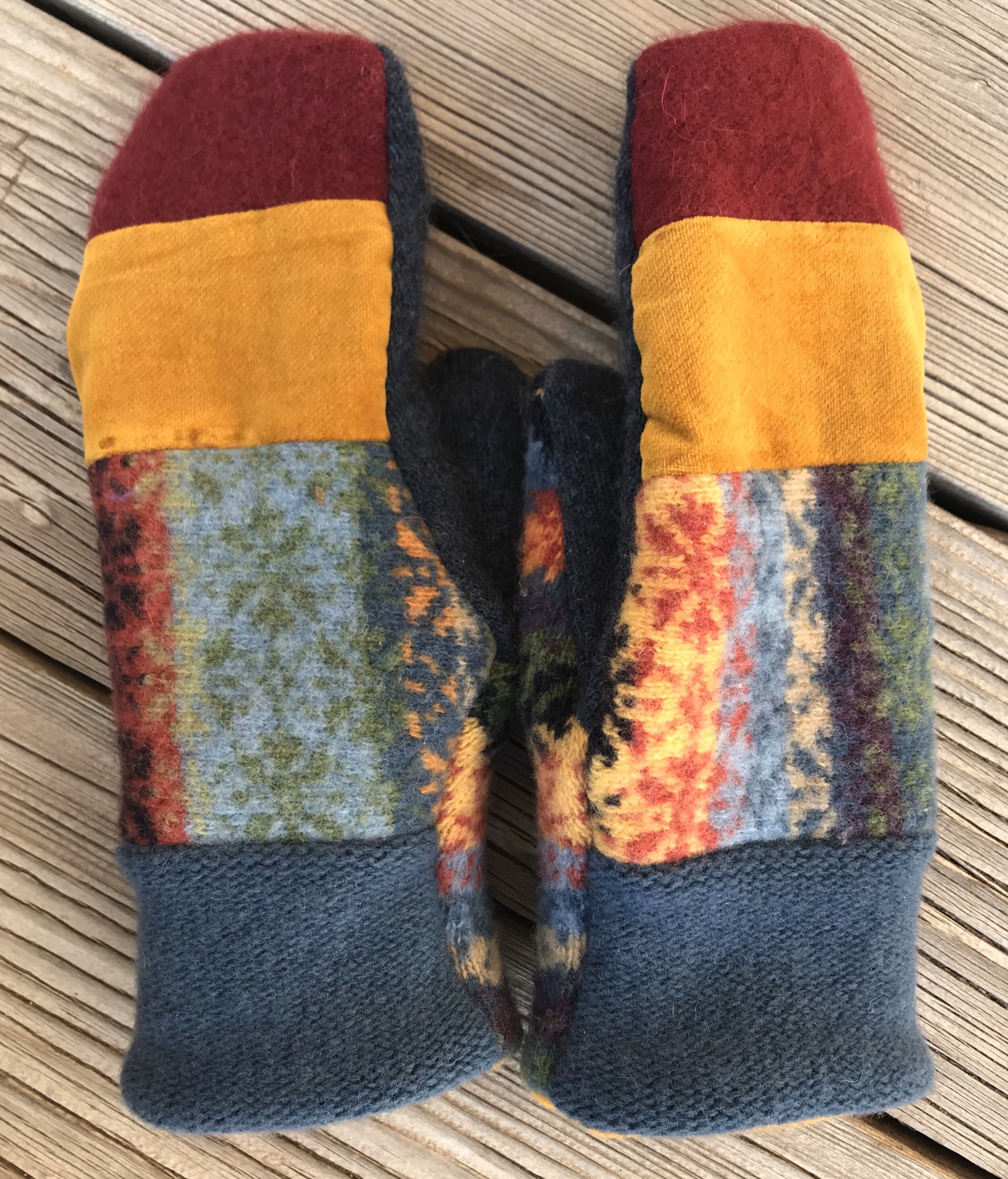  Upcycled wool mittens from recycled wool sweaters, fully lined with polar fleece. One size fits most. Handmade in Teton Valley, Idaho.  