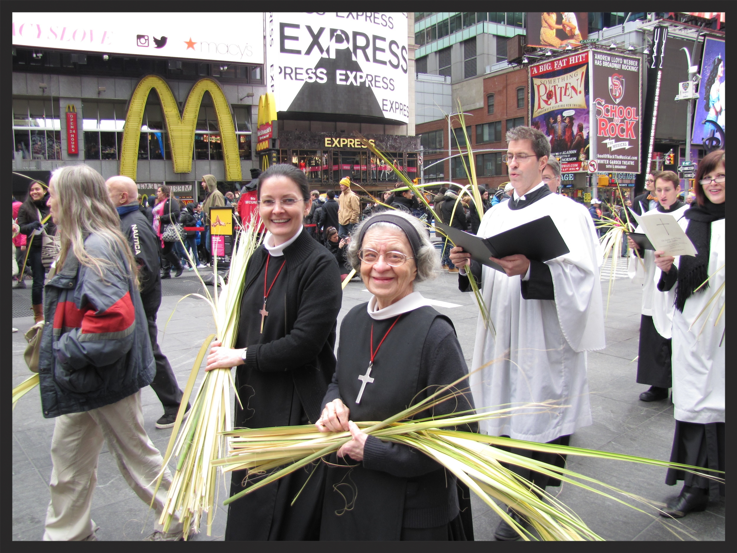 Sister Monica Clare, CSJB (L) and Sister Laura Katharine, CSJB (R) in the Palm Sunday processional through Times Square