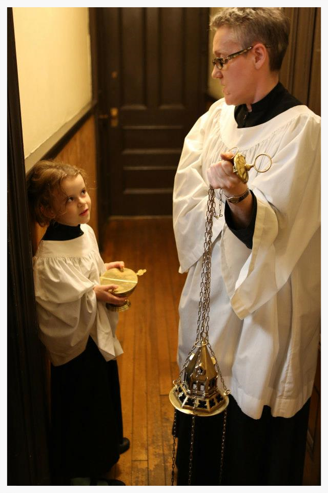 Exceedingly adorable incense boat girl and thurifer preparing for worship at Saint Mary's