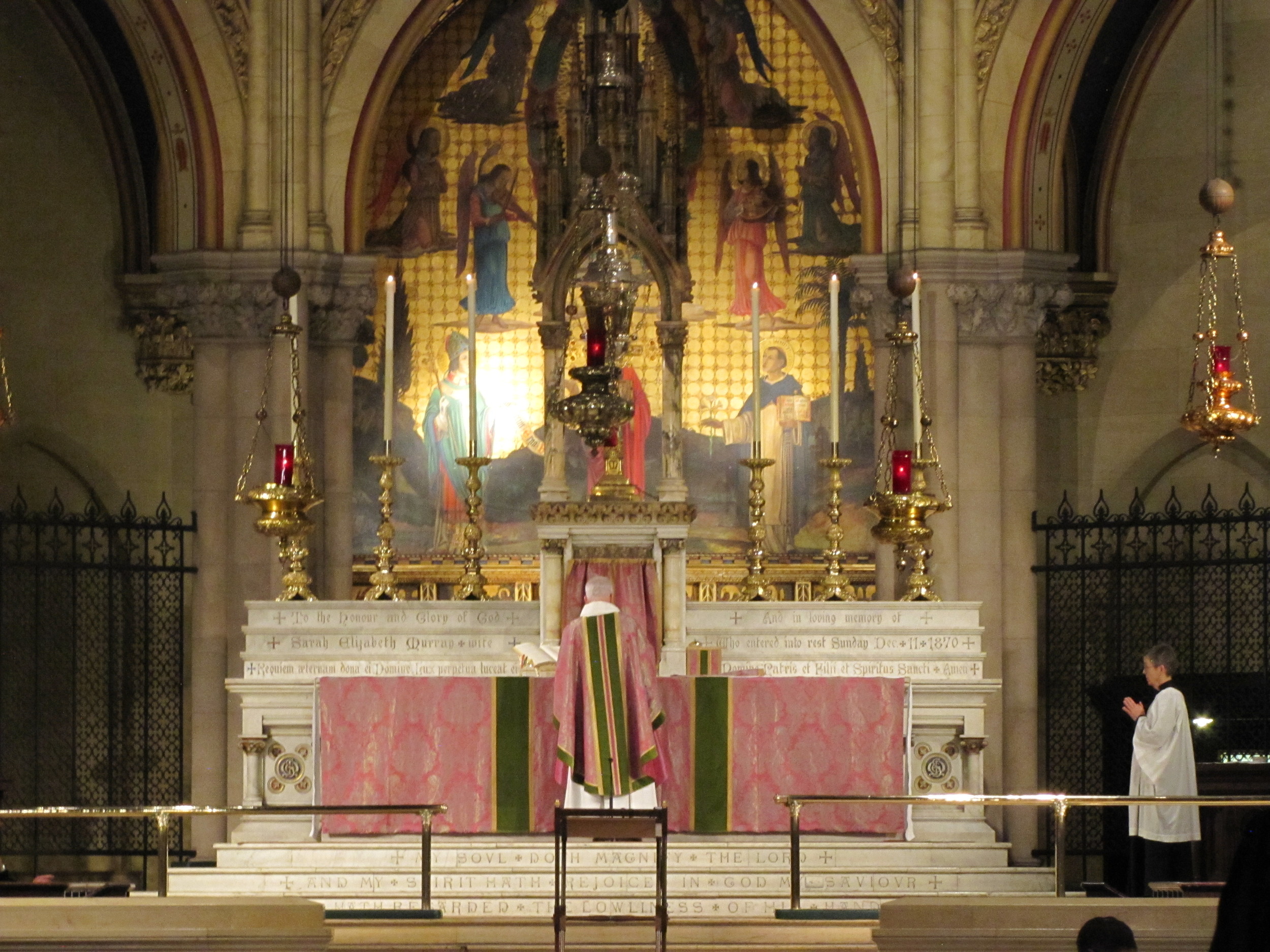 The Reverend James C. Pace celebrating weekday Mass at Saint Mary's