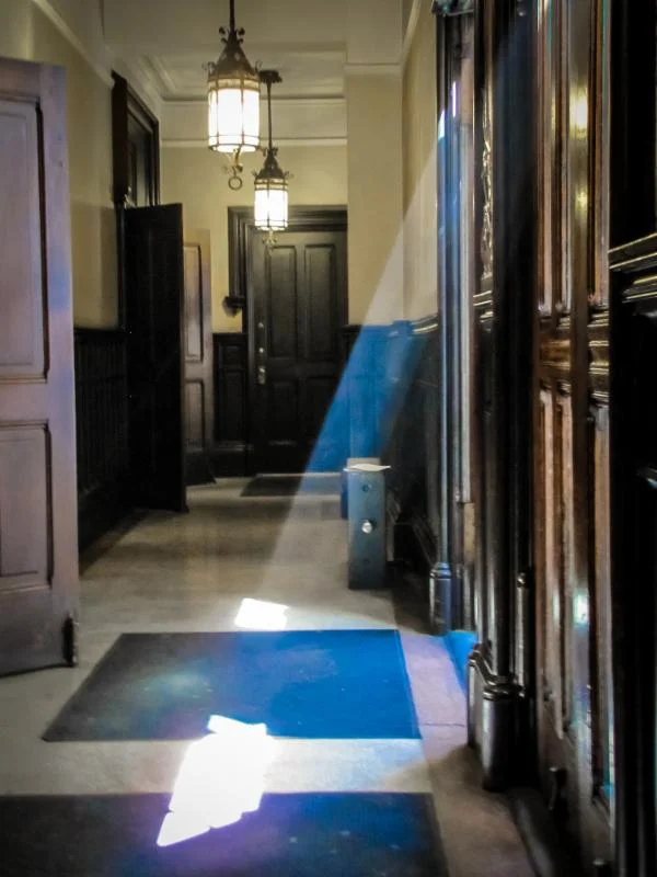 Sunlight filtering through the 46th Street doors of Saint Mary's
