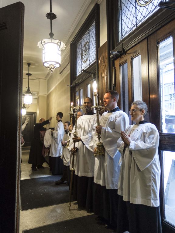Servers in the narthex before the dismissal