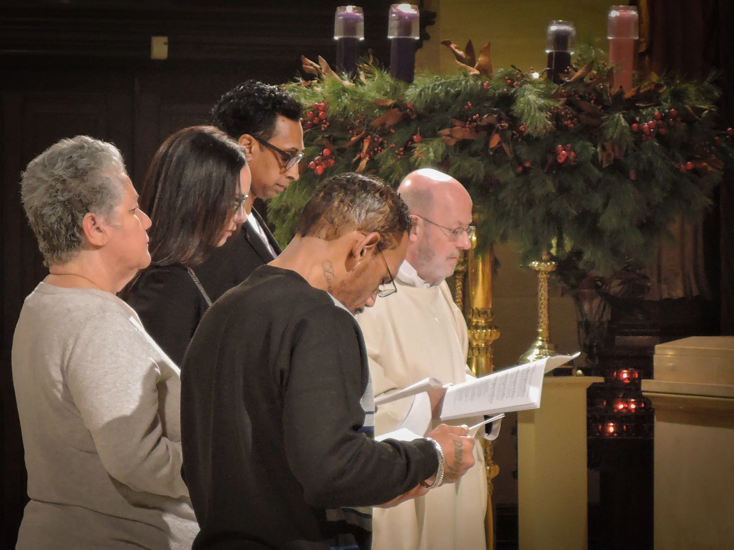 Father Smith presents those to be confirmed .