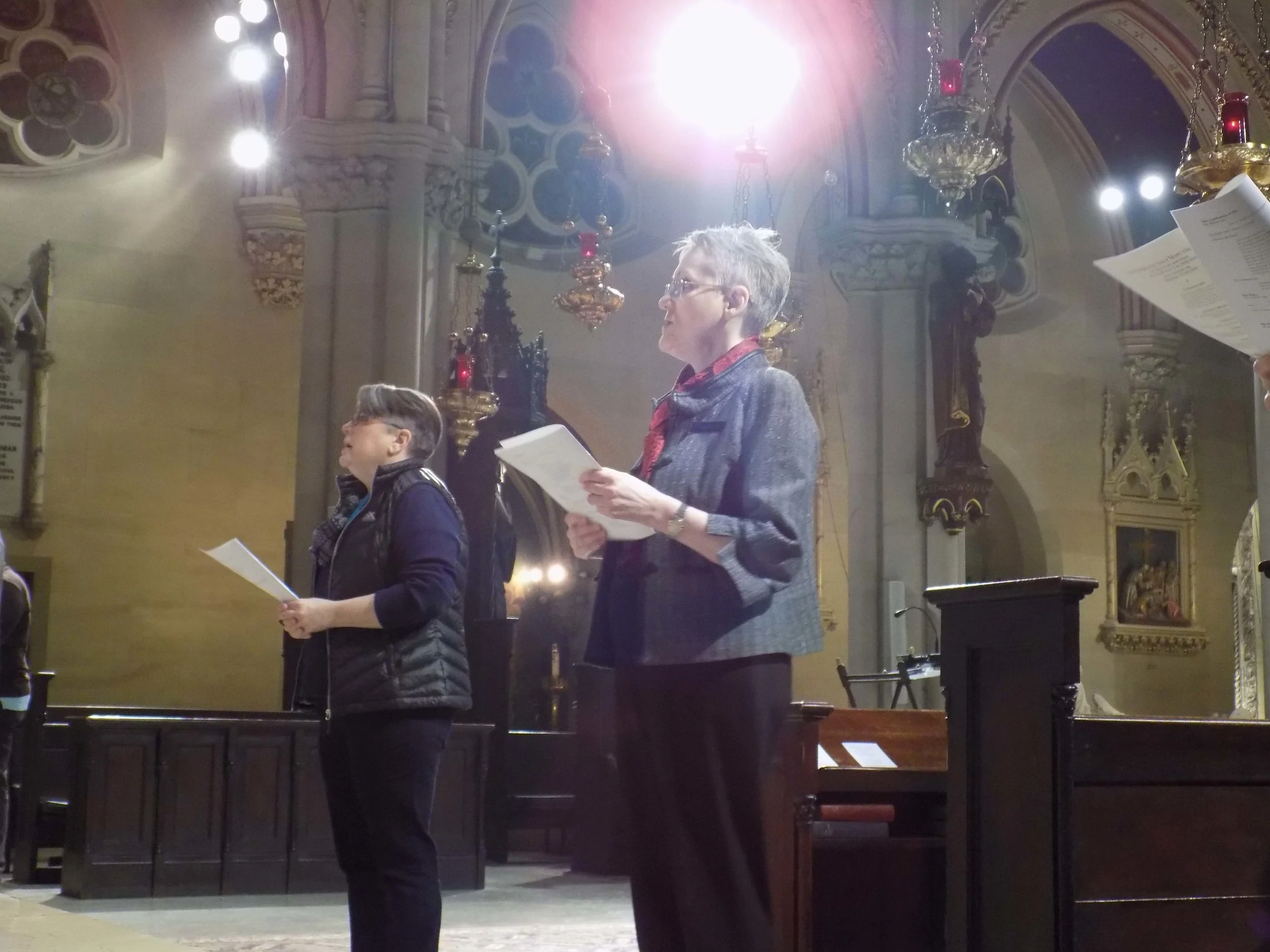 Mary Robison and Marie Rosseels were two of the ushers on Sunday, shown here during the Preparation of the Gifts.