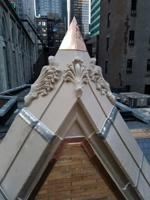 A new copper cap on the rectory roof until a donor for a new terra cotta cross comes forward. 