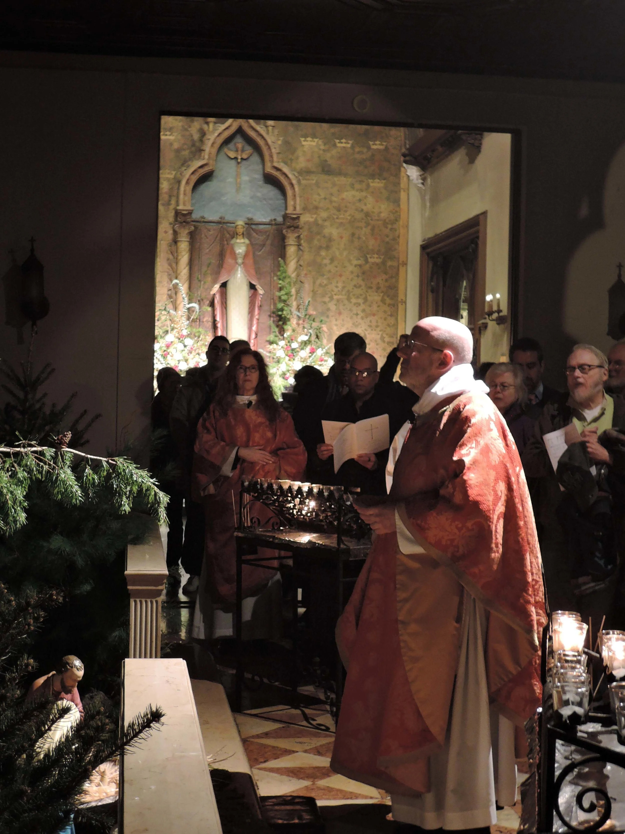 At the end of the Solemn Mass of Christmas Day, the congregation processes to the Creche for the Angelus. 