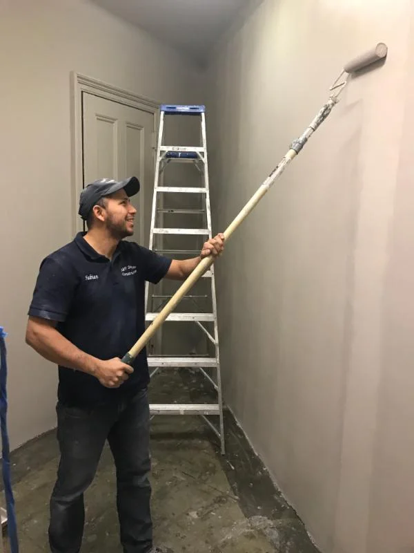 The smoke room walls are being covered with a fire retardant paint. 