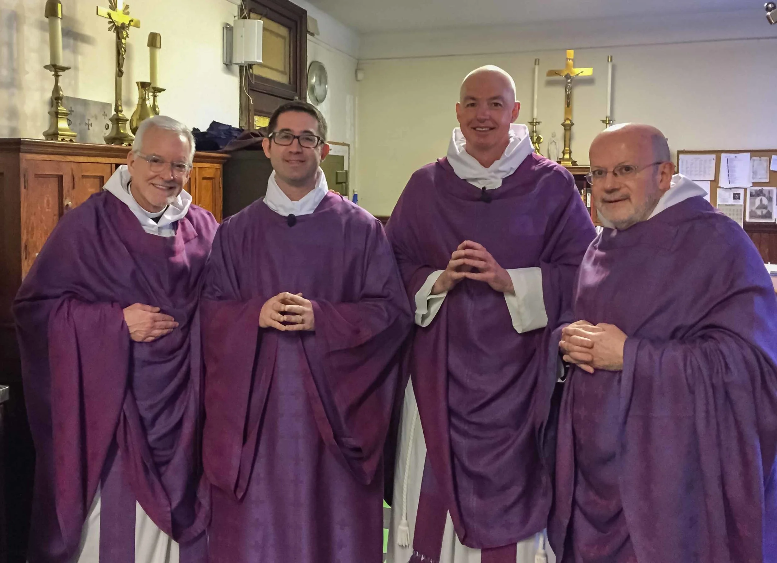 The parish priests with the newly ordained transitional deacon, the Reverend Dr. Matthew Jacobson, before the Solemn Mass on the First Sunday in Lent. 