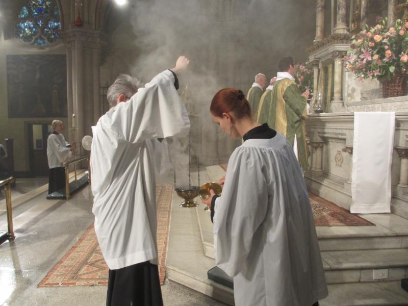 More incense is added and, if needed, the altar book is turned to the right page at the singing of "Blessed is he who comes in the name of the Lord." 
