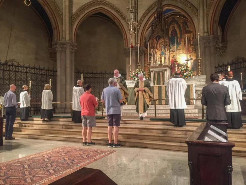 The Congregation's gifts of bread, wine, and money are presented.