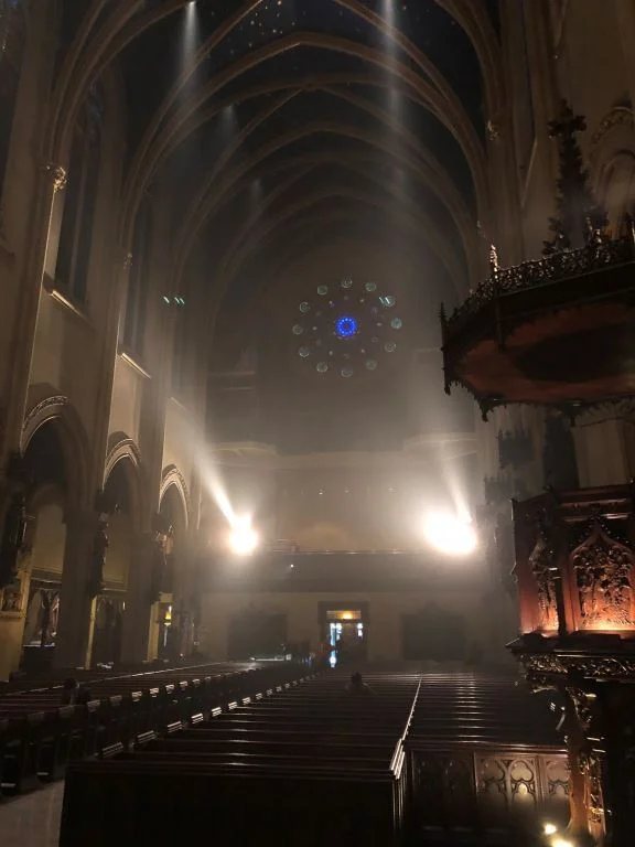 The gallery lights are turned on as the church is prepared for Evening Prayer and the Sunday Vigil Mass on the Eve of the First Sunday of Advent. Photo by Zachary Roesemann