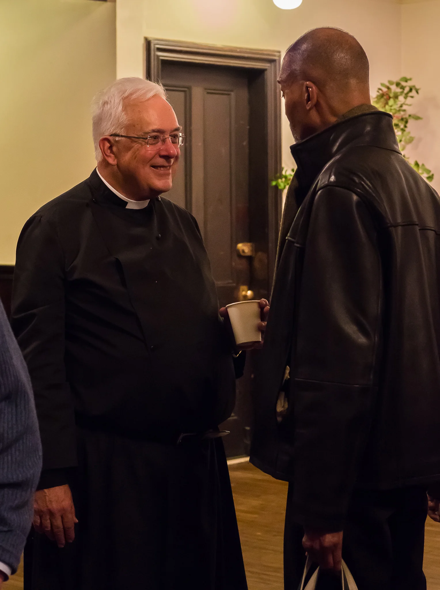 Father Pete Powell and Charles Carson at Coffee Hour after the Solemn Mass. Photo by Ricardo Gomez