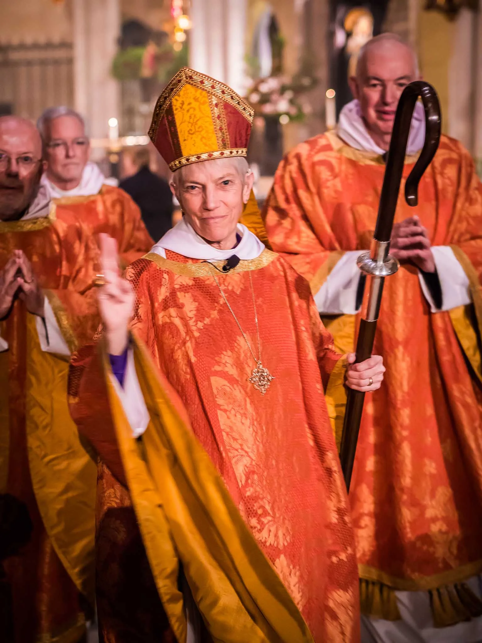 Bishop Glasspool blesses members of the congregation as the procession retires during the final hymn (and before the dismissal). Photo by Ricardo Gomez