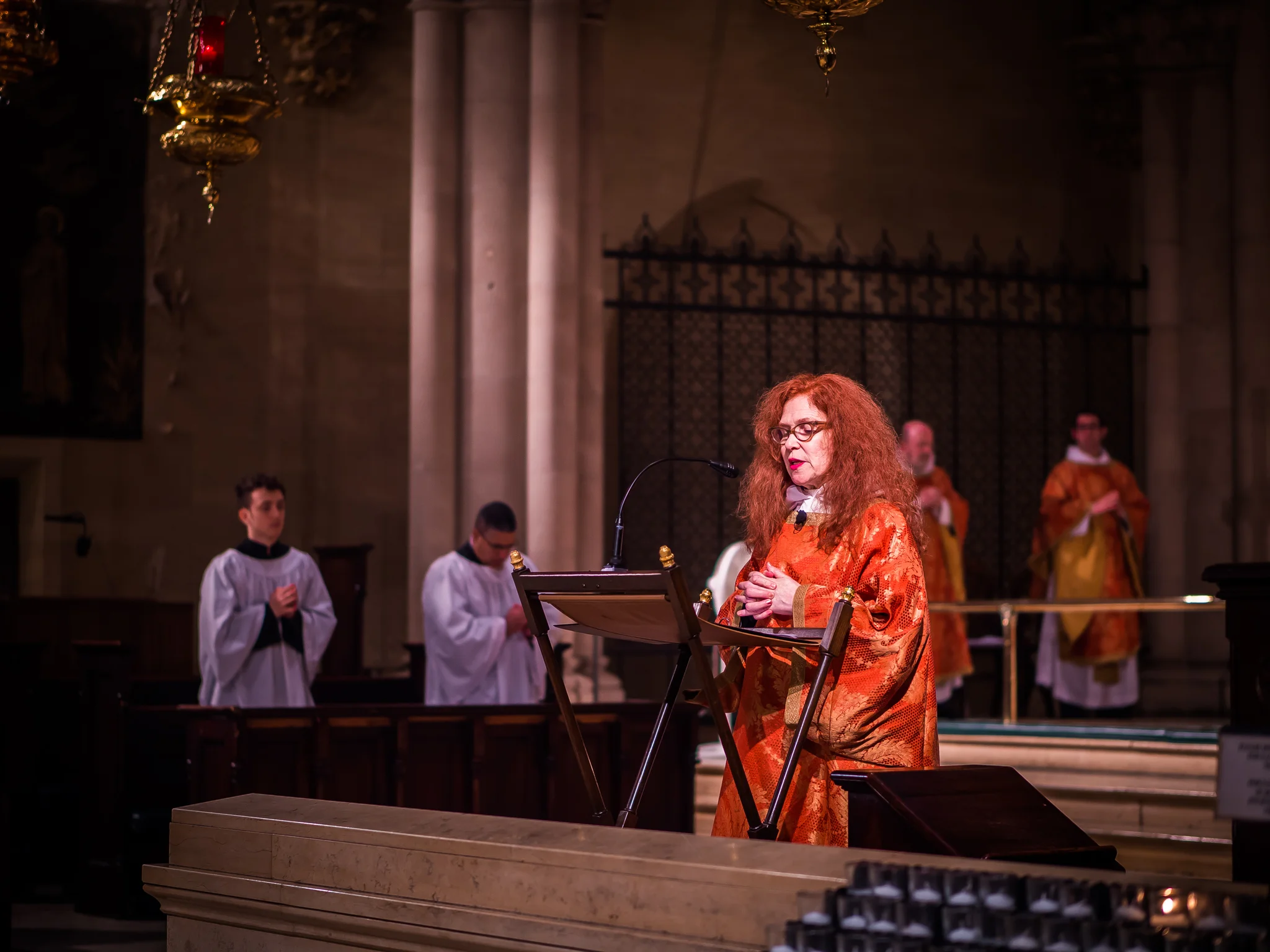 Deacon Rebecca Weiner Tompkins chants the Prayers of the People on the Day of Pentecost. Photo by Ricardo Gomez