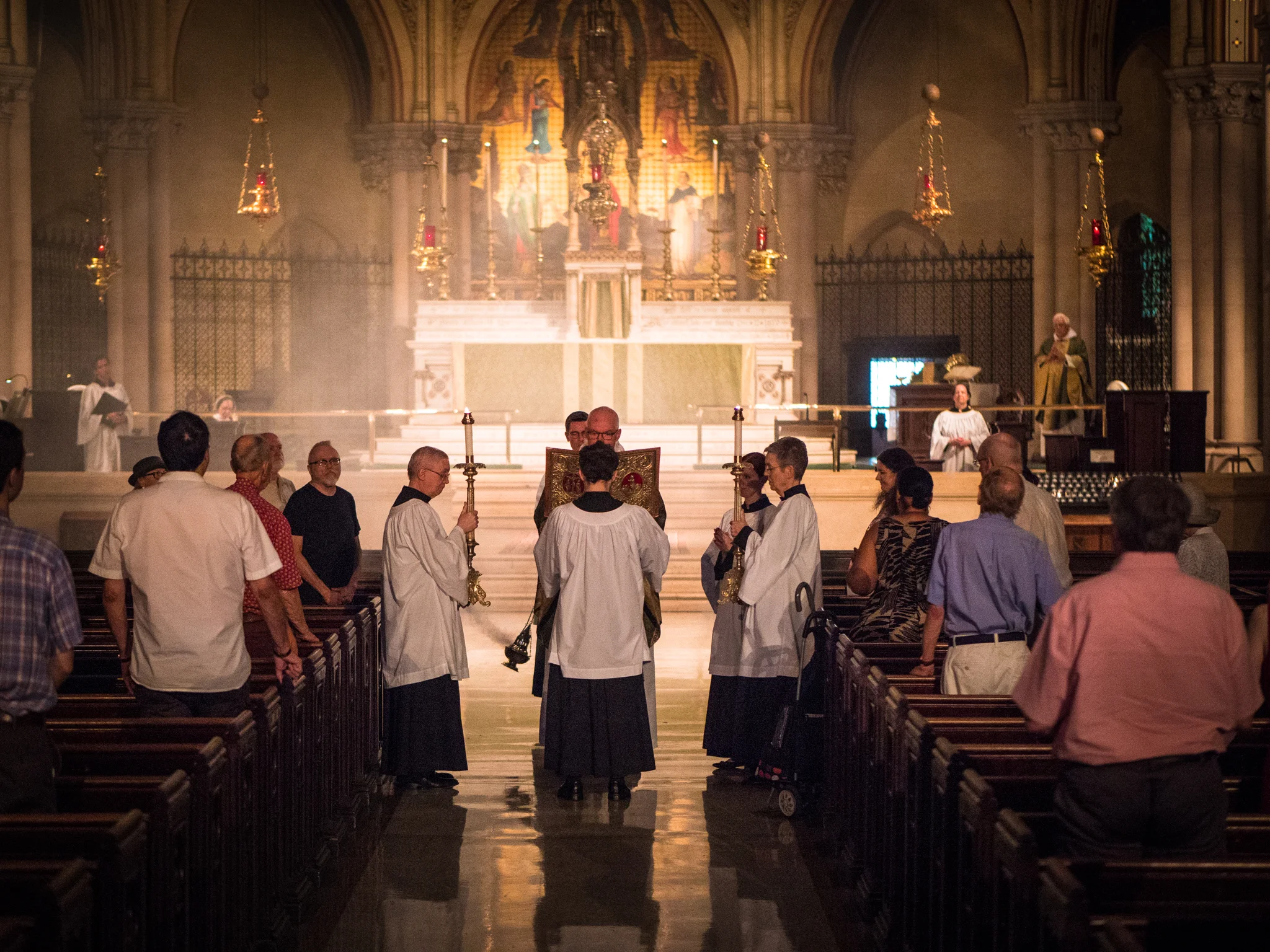 Incense is offered while the gospel is proclaimed. Photo by Ricardo Gomez