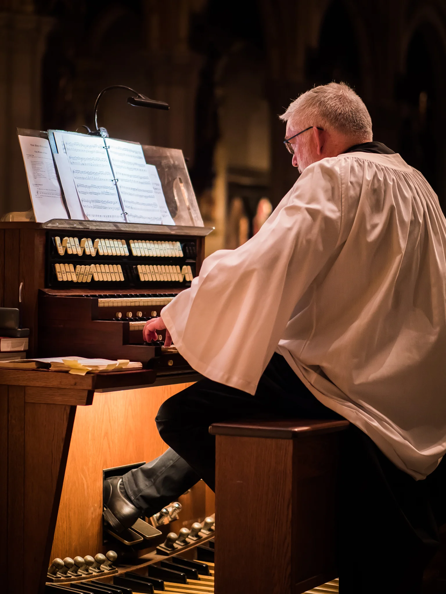 Parishioner Clark Anderson played for the Solemn Mass on August 5, while David Hurd attended the Organ Historical Society Conference in Rochester, New York. Photo by Ricardo Gomez 