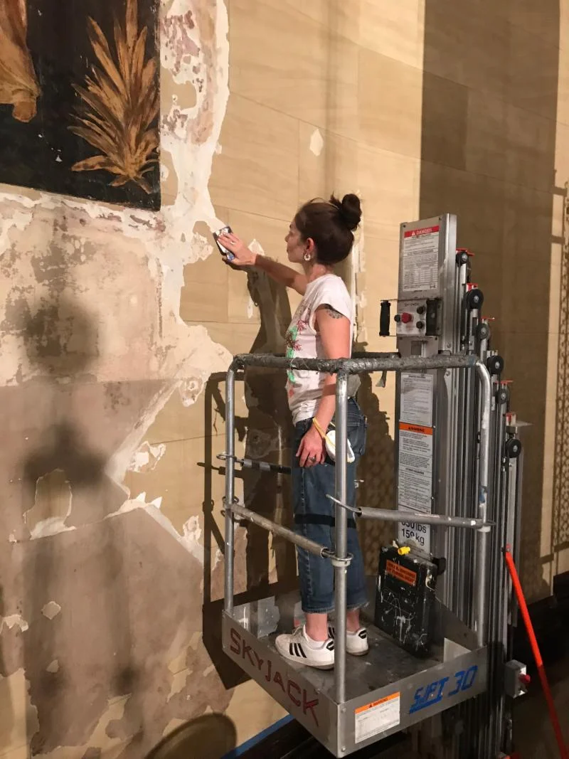 Masha Gittin, see-Painting, Inc., begins work on the bas relief. Photo by the Rector