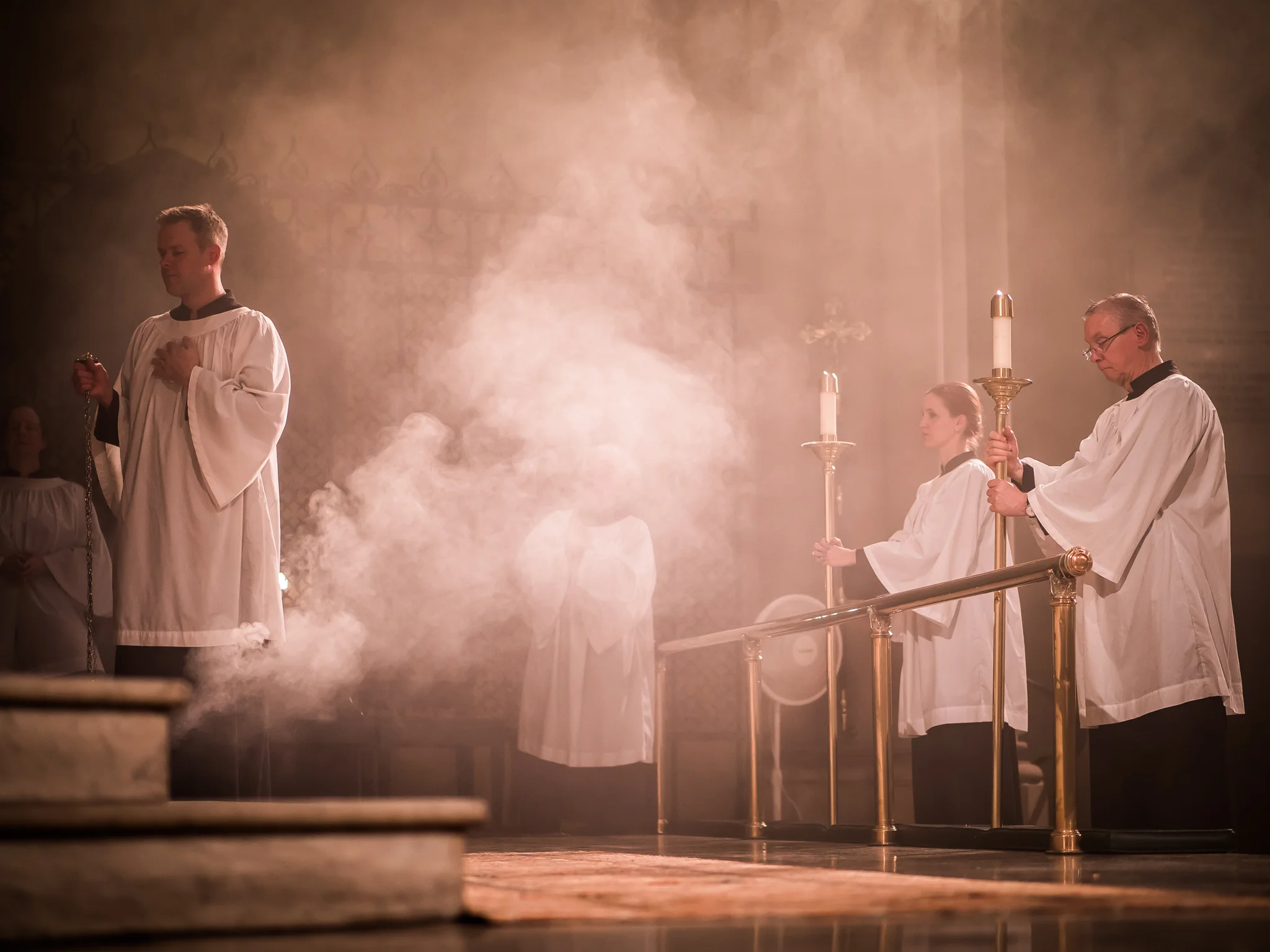 Clark Mitchell (L) was thurifer for the Solemn Mass on August 15. Photo by Ricardo Gomez
