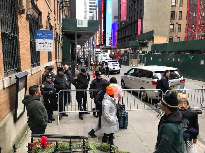 On New Year's Eve West 47th Street had checkpoints at Sixth Avenue and in front of Saint Mary's before noon. On December 31, 2019, we now plan to have the daily Mass at 9:00 AM, following Morning Prayer at 8:30 AM, and to close the church at 11:00 AM. Photo by the Rector