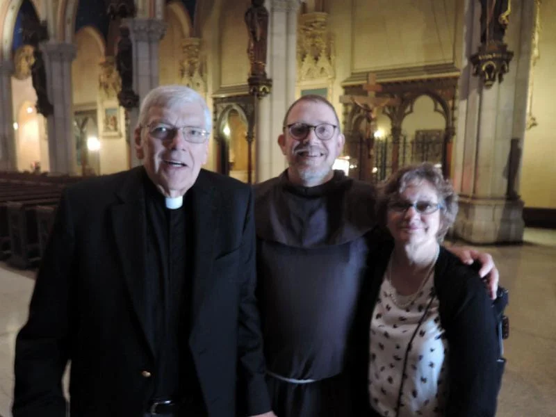 Brother Damien Joseph welcomed Father Ronald Jaynes and Mrs. Colleen Jaynes to Saint Mary's last Sunday. Photo: Stephen Gerth