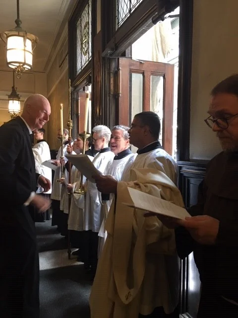 Smiles in the narthex as the Solemn Mass concludes. Photo: Renee Pecquex
