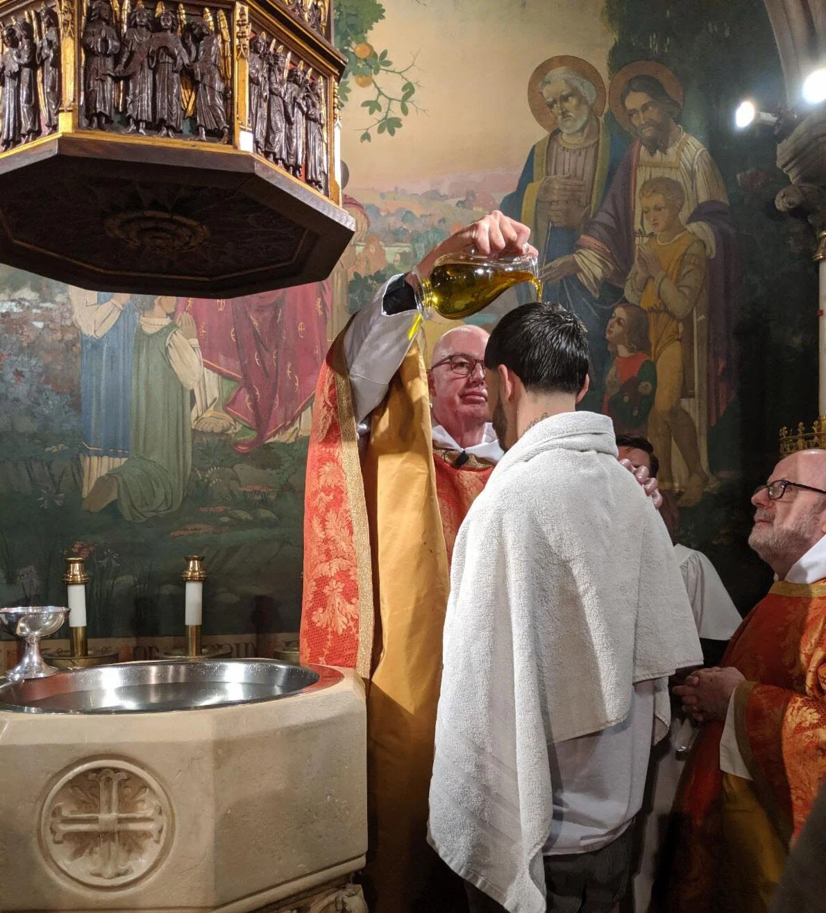 "Shalim, you are sealed by the Holy Spirit in Baptism and marked as Christ's own for ever." Photo: MaryJane Boland