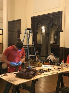 A team from Fifty Three Restorations, Inc. was here this week to work on one set of the tambour doors between the church and Saint Joseph's Hall. We will have a full report in next week's Angelus. Photo: Jay Smith