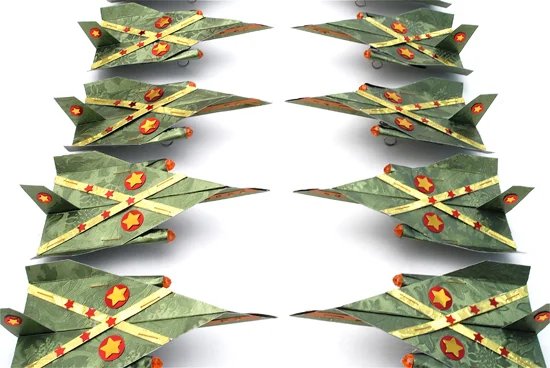 A-9 Flowerhawk , 2007 Paper, foil, tape, staples, plastic beads and sequins, dimensions variable, 18" x 36" x 2" as shown