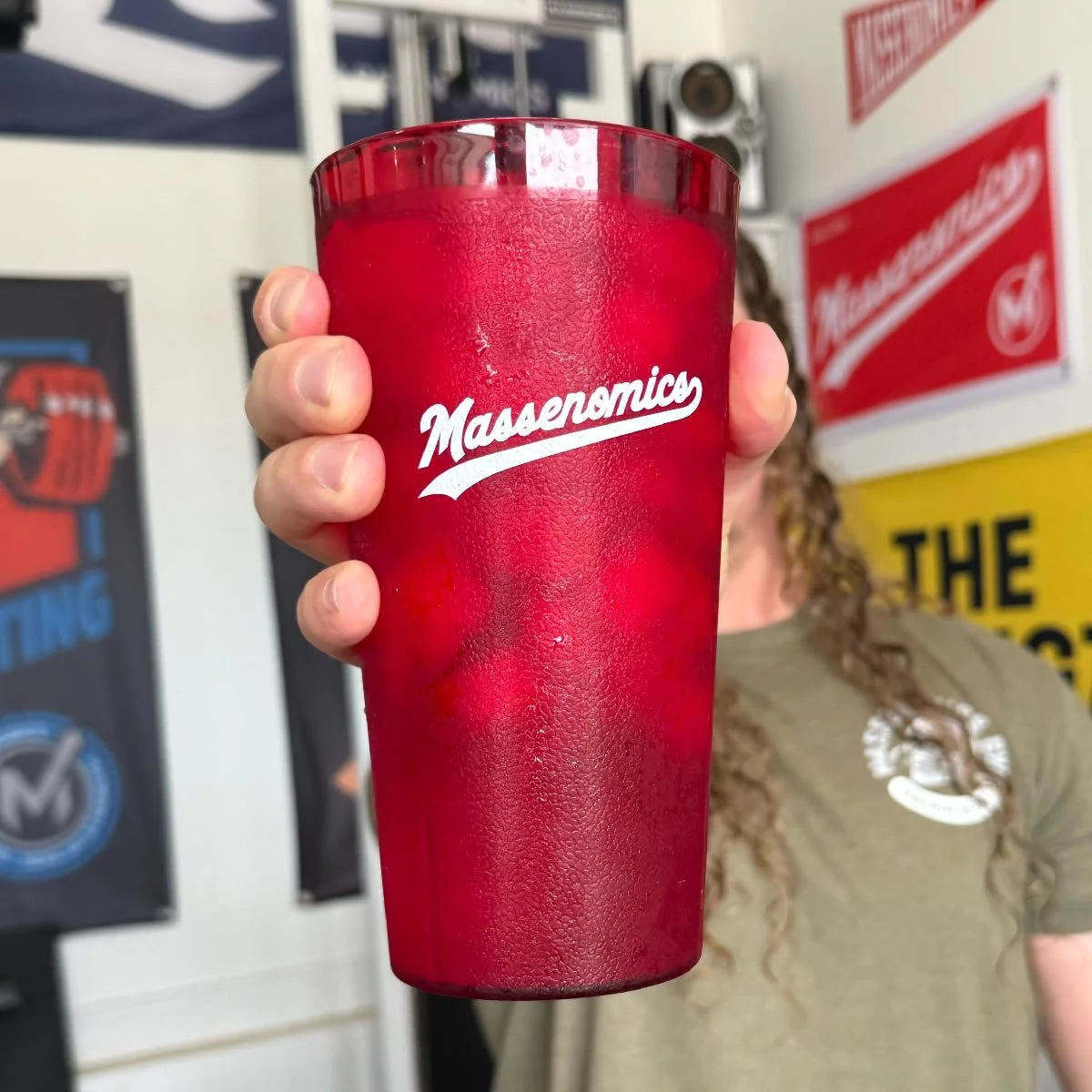 red vintage cup in hand