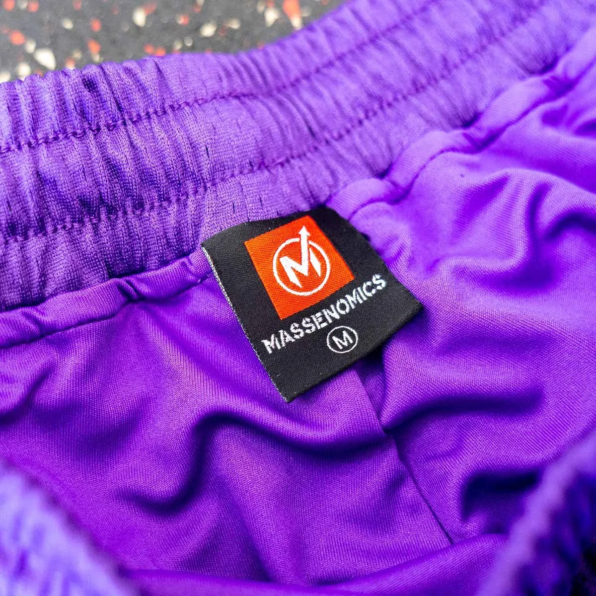 purple shorts tag