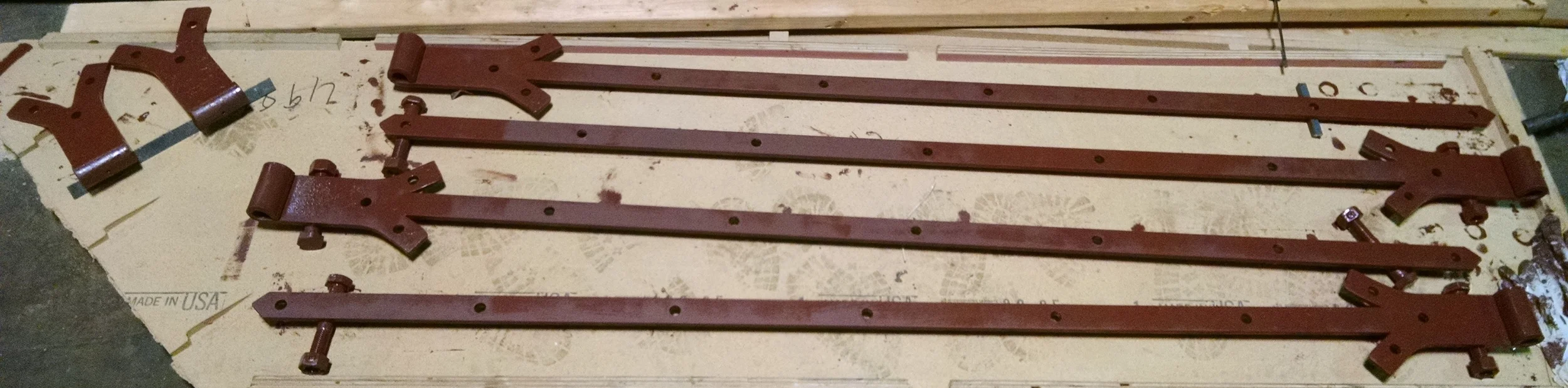 Barn door hinges, primed