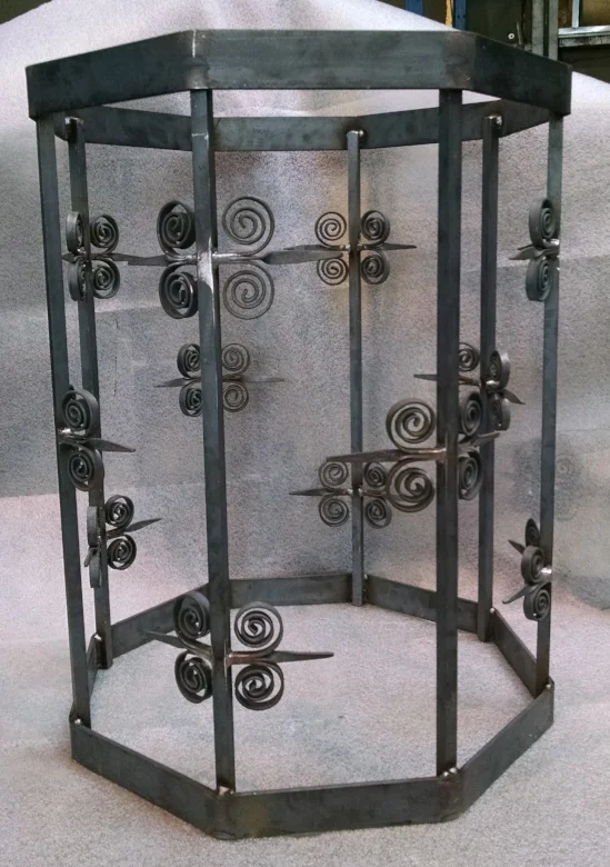 Recycling/trash can surround produced in tandem with Providence Hammer LLC Hand forged scroll motifs