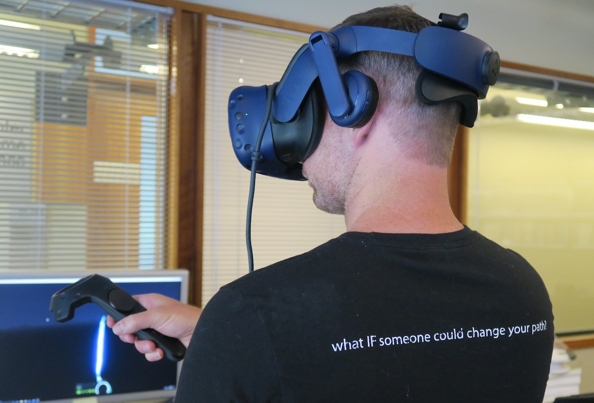 Dolphy Jordan, from the Washington Statewide Reentry Council, trying out the HTC Vive VR system at the UW Reality Lab (Kessler, 2018).