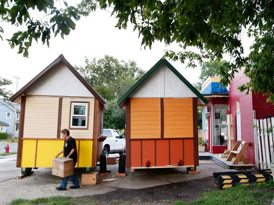 Occupy Madison: Permitted Sleep and Service Hub on private land (church property) in Madision, Wisconsin City Zoning Approval: The Madison Common Council voted to amend the city's zoning code to allow tiny houses, like the single 96-square-foot trailer-mounted cottage Occupy Madison has constructed so far, to be set up on the property of churches and other non-profit organizations.