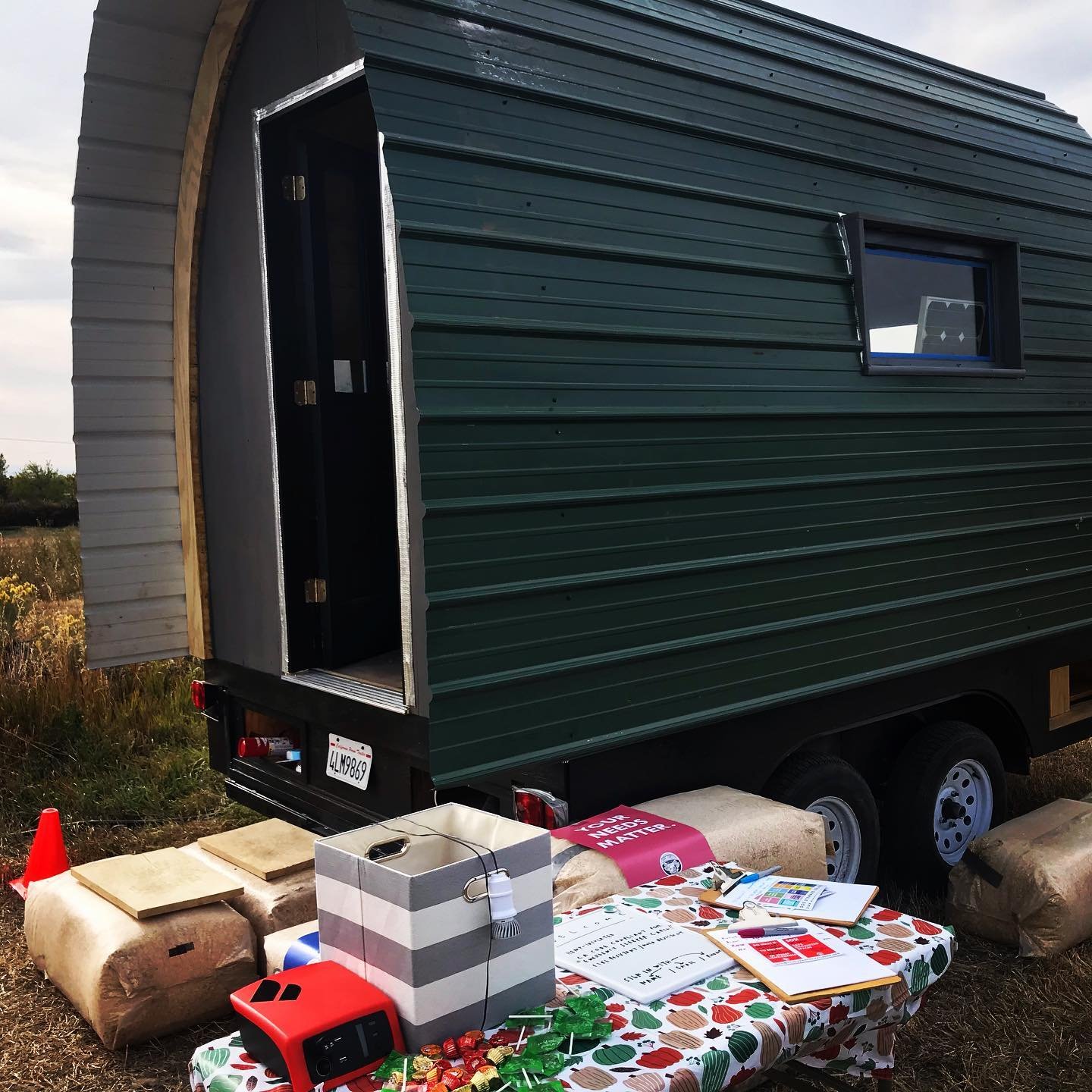 A scene from the Hemp Sleeper Cabin prototype open house and celebration at SnowMansion Lodge/Gardens in northern New Mexico. It was a potent gathering of builders, stewards, and healers working for a thriving humanity and planet, and gave much hope 