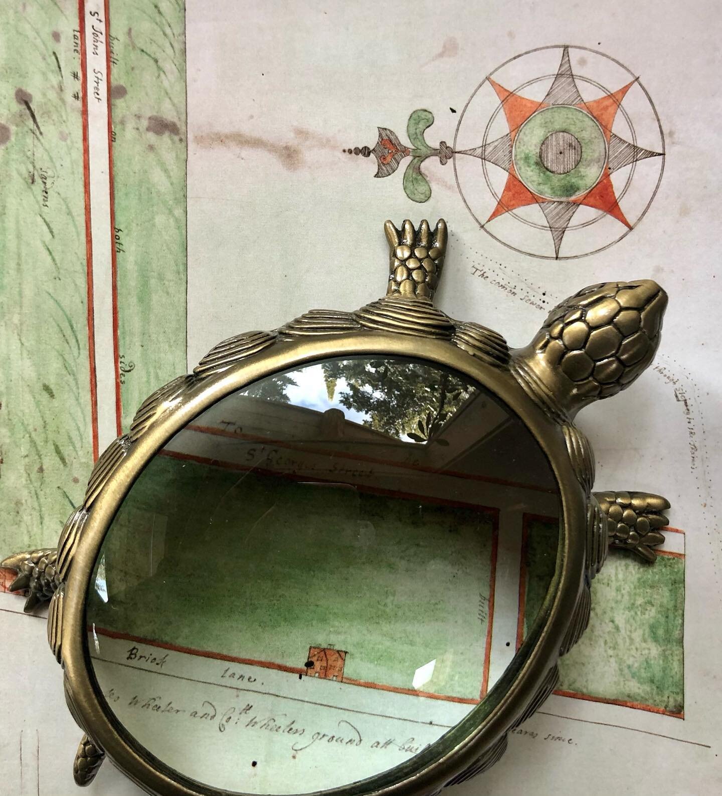 Don't overlook the details. Tortoise magnifier headed to a home library design project (though I'm tempted to keep him here with me). Sidenote: not to worry, rare book friends, this is a reprint of a rather old map in a spanking new book. No heavy tu