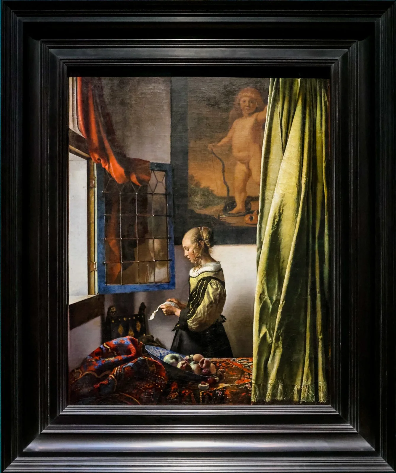 5 A Girl Reading a Letter at an Open Window.jpg