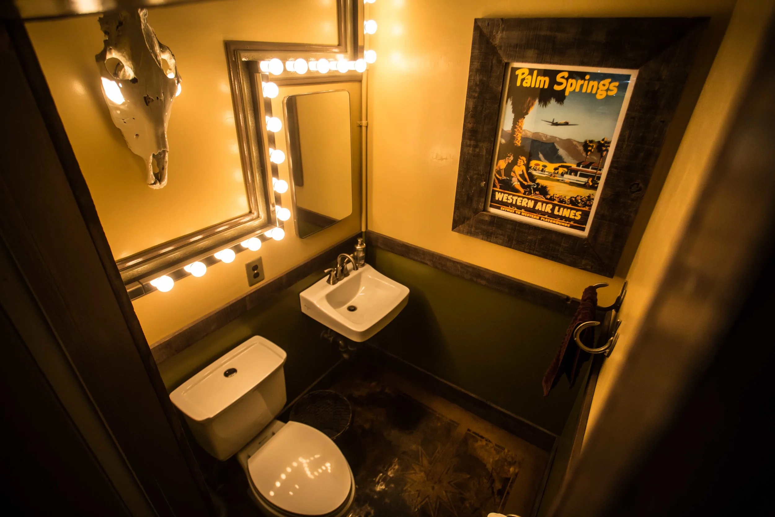 our second restroom features a rustic desert theme.