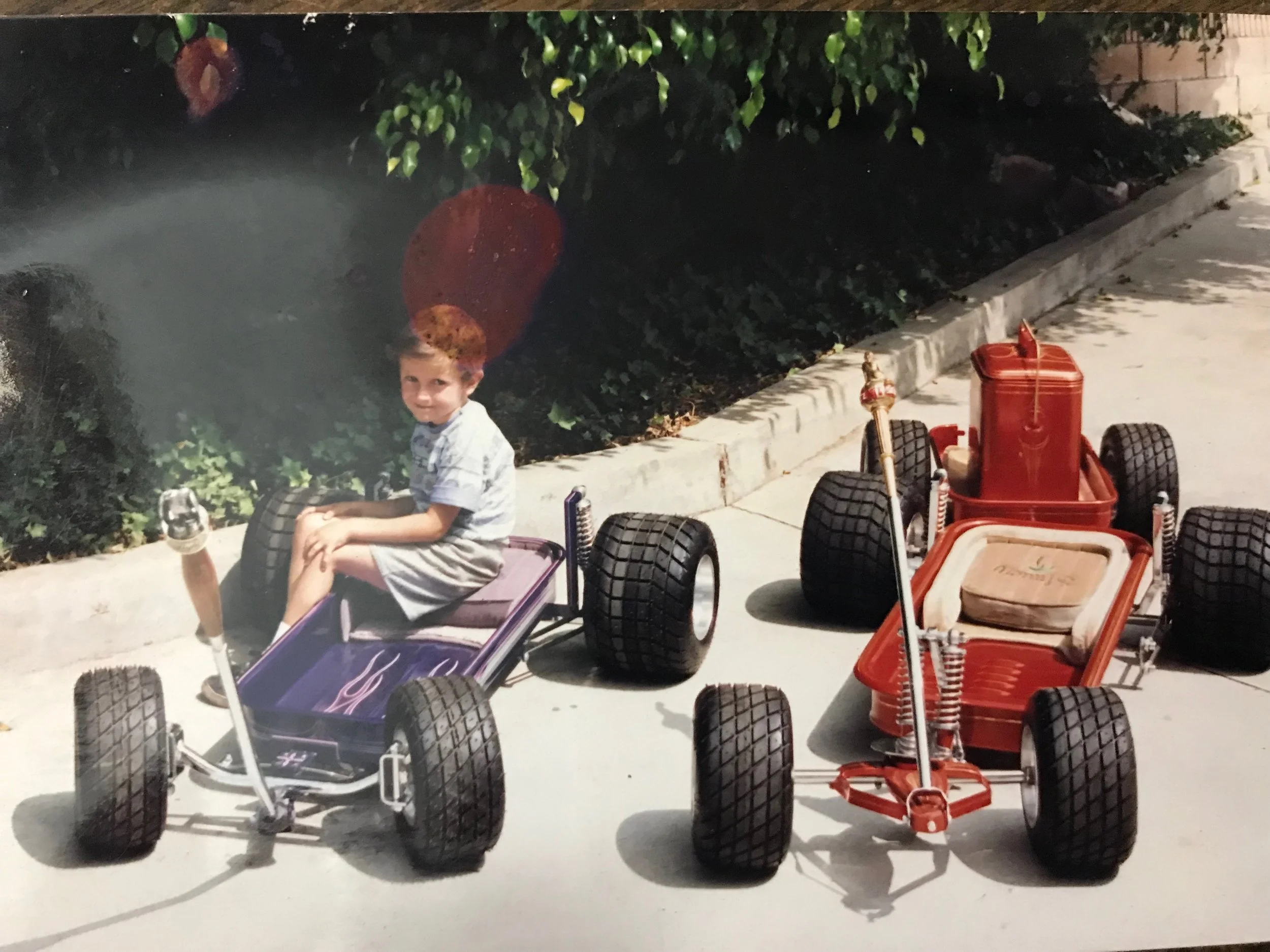 Shawn with his 1st 2 wagons his dad built in 1992