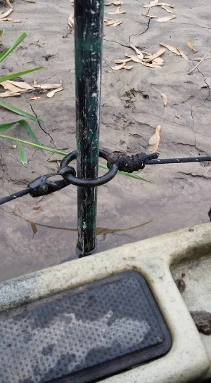 Use a mud anchor to secure yourself to the bank. 